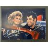 Image 1 : OLIVIA NEWTON JOHN AND JOHN TRAVOLTA GREASE SIGNED 8 X 10 (RA COA)