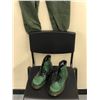 Image 2 : "Ivy + Bean Movie"   bean photo double military jumpsuit with pair of boots