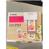 Image 2 : Canon selfie compact photo printer cp 300 with extra printing sheets and color ink