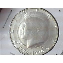 Counter Punched 1976 Kennedy Half Dollar