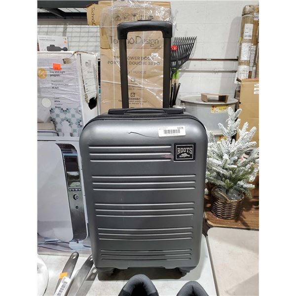 Roots Hard Shell  Rolling Suitcase with Crack