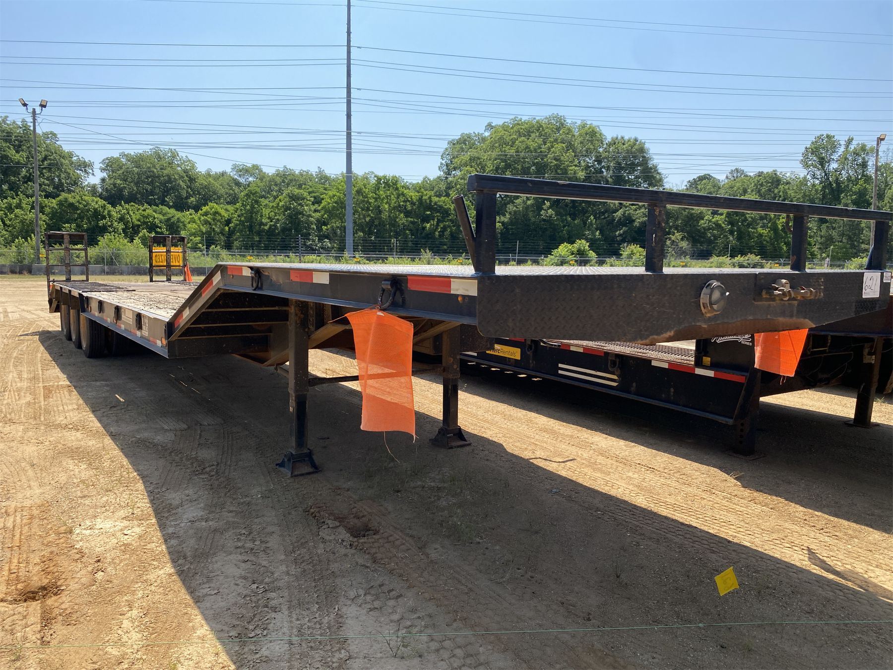 2021 FMI Lowboy Trailer J.M. Wood Auction Company, Inc.