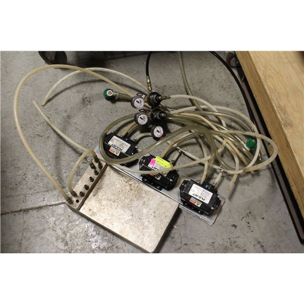 THREE FLOJET FOUNTAIN PUMPS W/ COOLING BLOCK