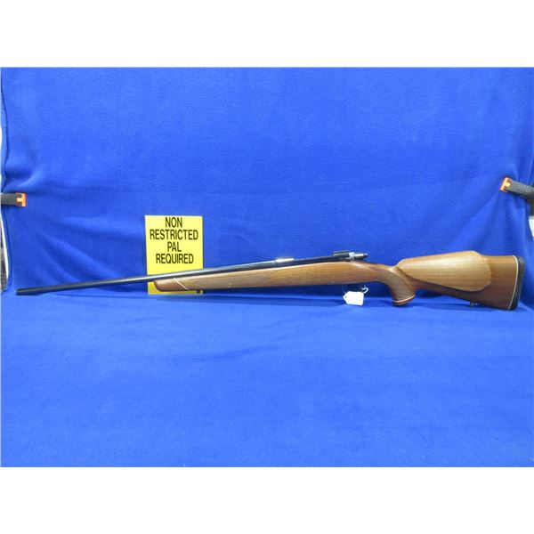 Non-Restricted - Tikka Model M65 in 338 Win Mag