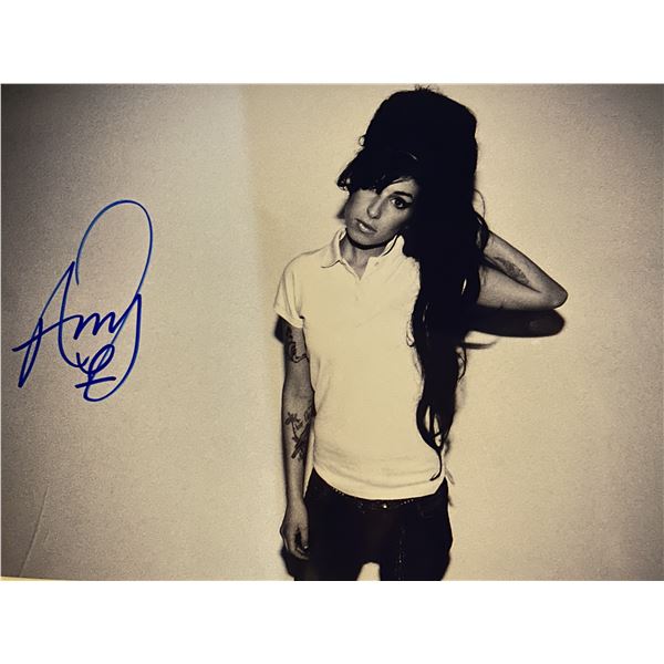 Amy Winehouse signed photo. 8x10 inches