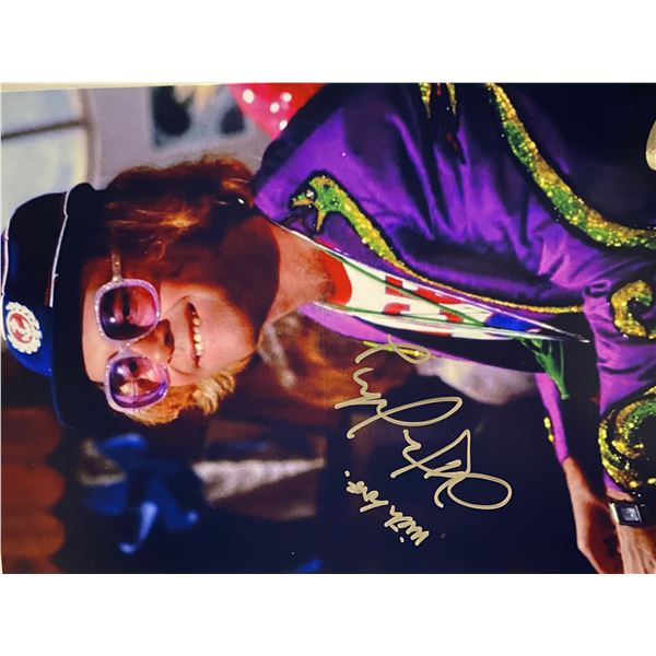 Elton John signed photo. 8x10 inches