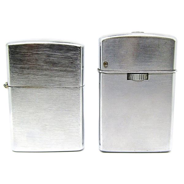 (2) VINTAGE PENGUIN & SAROME LIGHTERS!