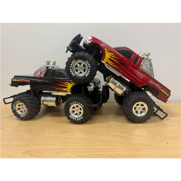 2 Fast Lane Monster 4x4 Trucks Not Tested No remotes or adaptors