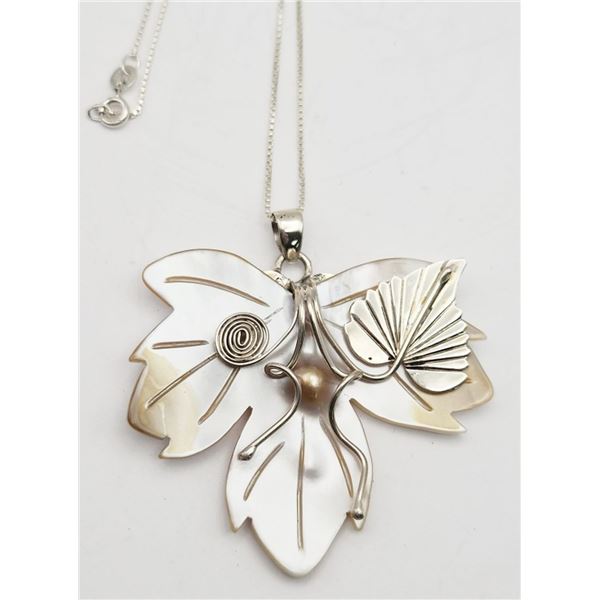 CARVED SHELL FLOWER PENDANT WITH STERLING