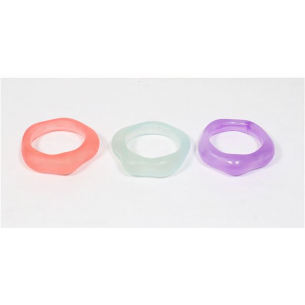 3 NEW STACKABLE RESIN RINGS (CONTAIN BUBBLES)