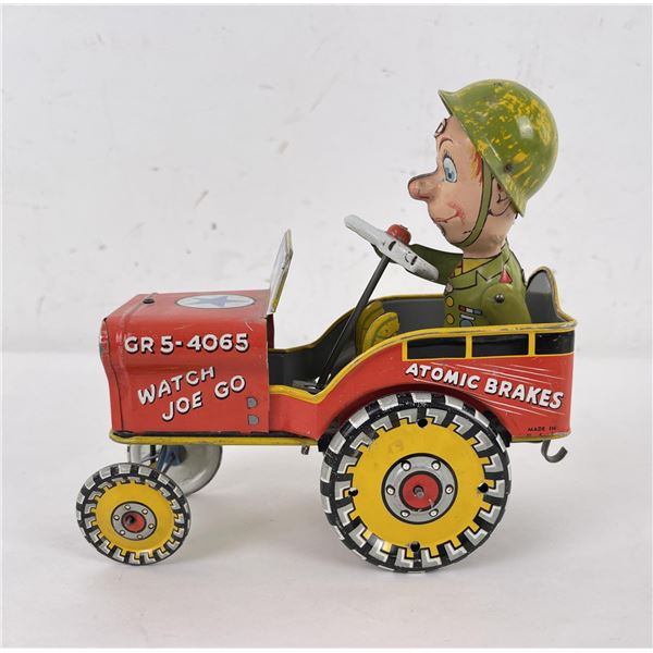 G.I. Joe and his Jouncing Jeep Wind Up Tin Toy