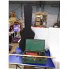 *Coleman stove, guitar case, wall hanging