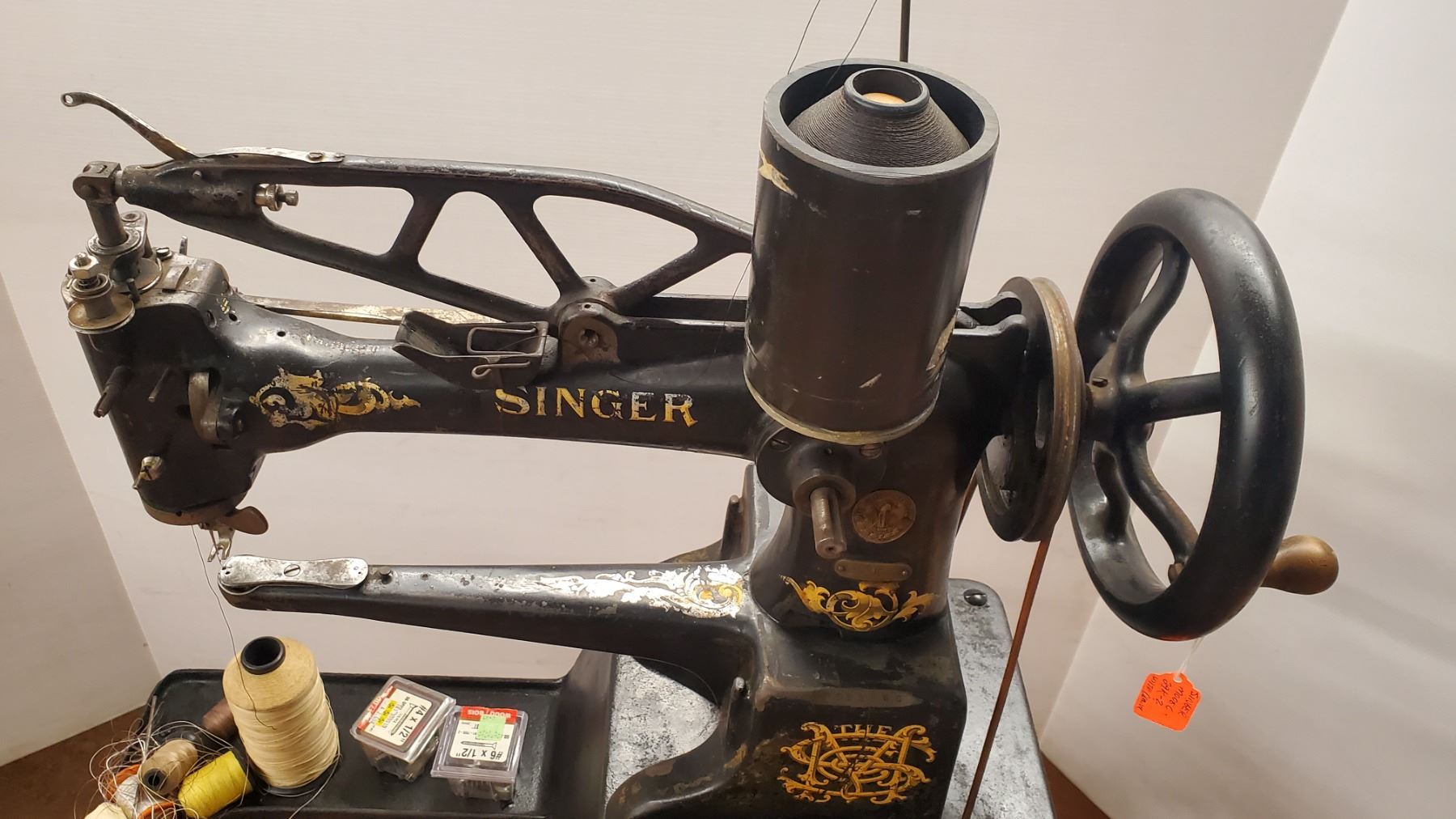 Antique Singer model 29K-2 on cast iron stand (with wooden drawer)