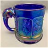 Image 1 : Imperial Glass Company Electric Blue RARE Carnival Glass "Nursery Rhymes" Mug with Elephant Head Han
