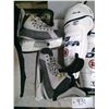 Image 3 : Hockey Equipment ( pants, skates (9.5EE), shin pads X2 ( 36 and 38 cm), mouth guard