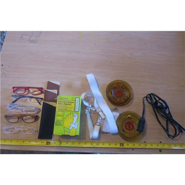 Assorted lot of glasses, ash trays, extension cord, bunionprofoot and suspenders