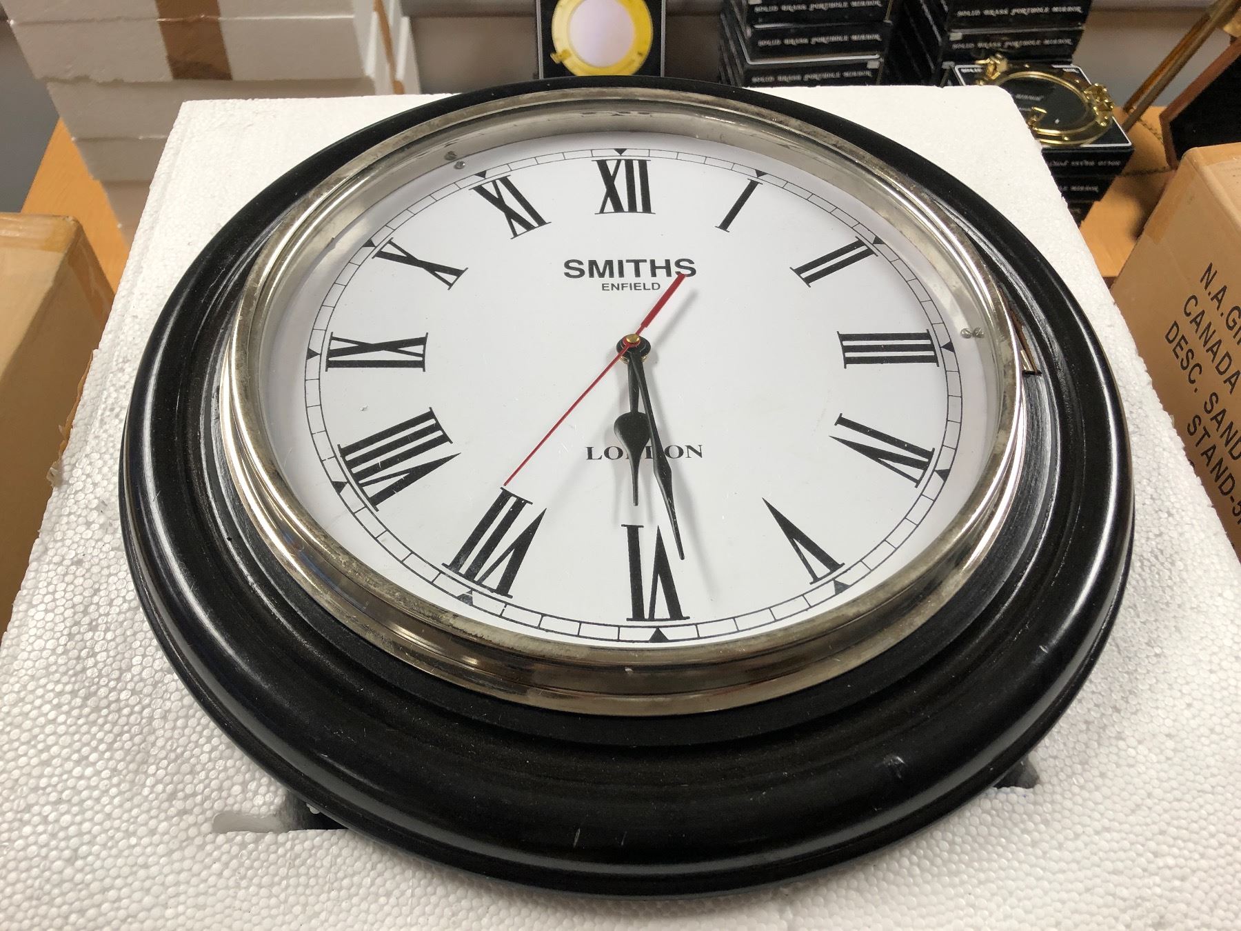 Group of four antique reproduction wall clocks