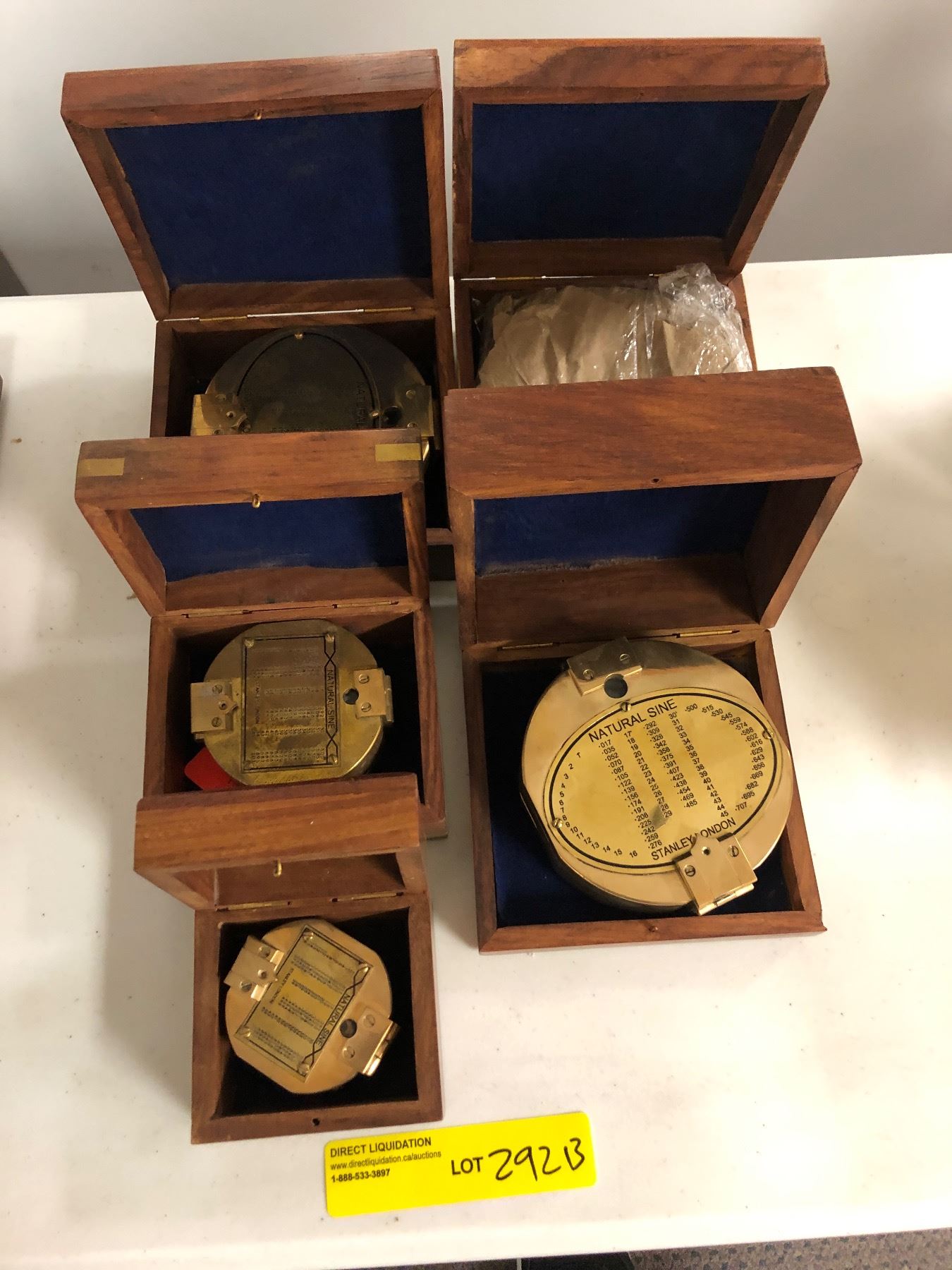 Group of assorted size new antique reproduction brass geological compasses