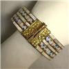 Image 1 : MOTHER OF PEARL INLAID  AND BRASS BANGLE