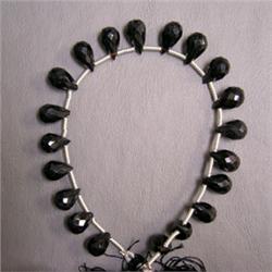 71 CTS ONYX BRIOLETTE STRAND 10x6 MM