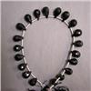 Image 1 : 71 CTS ONYX BRIOLETTE STRAND 10x6 MM