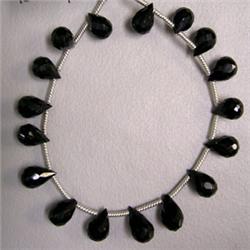 53 CTS ONYX BRIOLETTE STRAND 10x6 MM