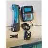Image 2 : MAKITA DTM51 18V MULTI TOOL WITH BATTERY AND CHARGER - TESTED WORKING