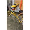 Image 2 : DEWALT 12 INCH DOUBLE BEVEL SLIDING COMPOUND MITER SAW AND FOLDING ROLLING STAND - TESTED WORKING