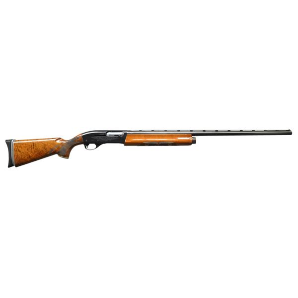 REMINGTON MODEL 1100 TRAP SHOTGUN.
