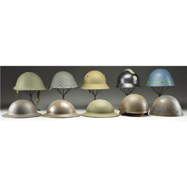 13 MILITARY HELMETS.