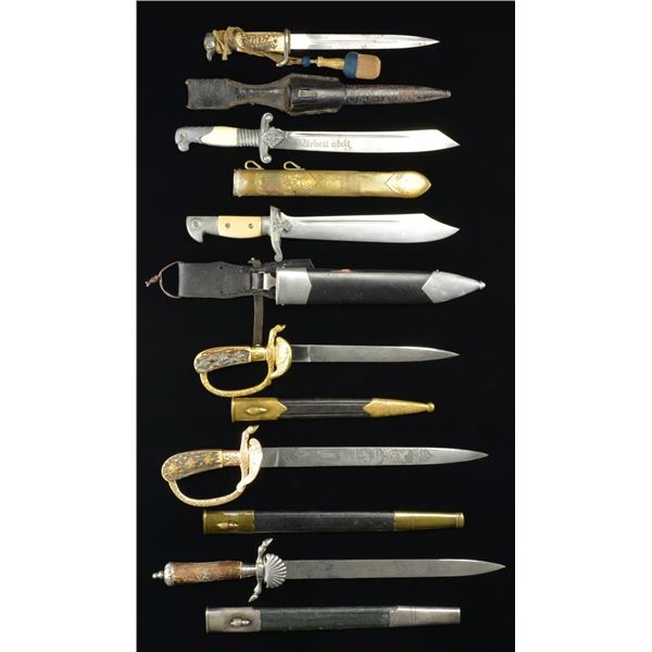 6 REPRODUCTION WWII GERMAN DAGGERS.