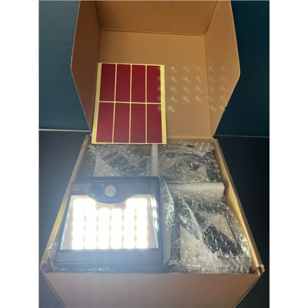 Lot of 1 8Pack of LED Solar Lights for Home & Garden w/ Motion Sensor