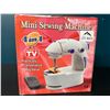 Image 1 : Lot of 1 Mini Sewing Machine