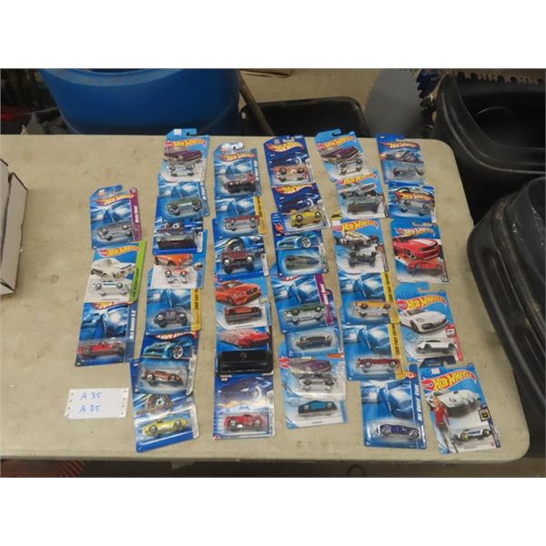 34 Hot Wheels New in Package - Most 20 yrs Old or More - 1 Mystery Package