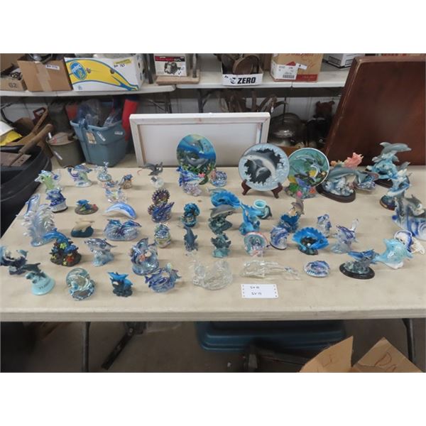 Large Assortment of Glass Ornamental Dolphins