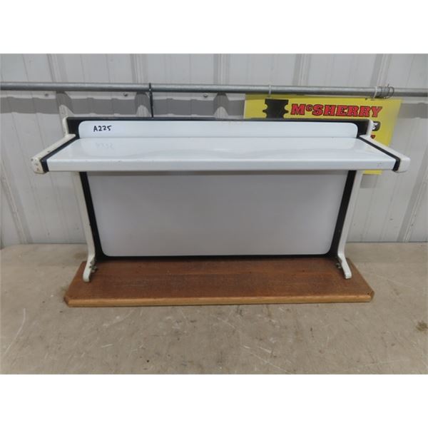 Vintage Porcelain Stove Part Repurposed into Hanging Shelf