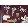 Image 2 : Tray of Jewelry; Rhinestone Brooches, Gesch Necklace + Earrings, Cinnabar Bracelet, Seal Fur Change 