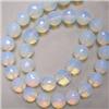 Image 1 : 12 MM FACETED SEA OPAL STRAND