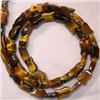 Image 1 : 9x6 MM TULIP SHAPED TIGER EYE STRAND - 16 INCHES