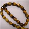 Image 1 : 12x8 MM FACETED TIGER EYE STRAND - 16 INCHES