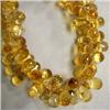Image 1 : 310 CTS GOLDEN CITRINE BRIOLETTE STRAND 10x7 MM
