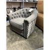 Image 1 : BRAND NEW COMFORTLAND GREY TUFTED SWIVEL ACCENT CHAIR - RETAIL $899 W/ GEL AND FEATHER CUSHION FOR E