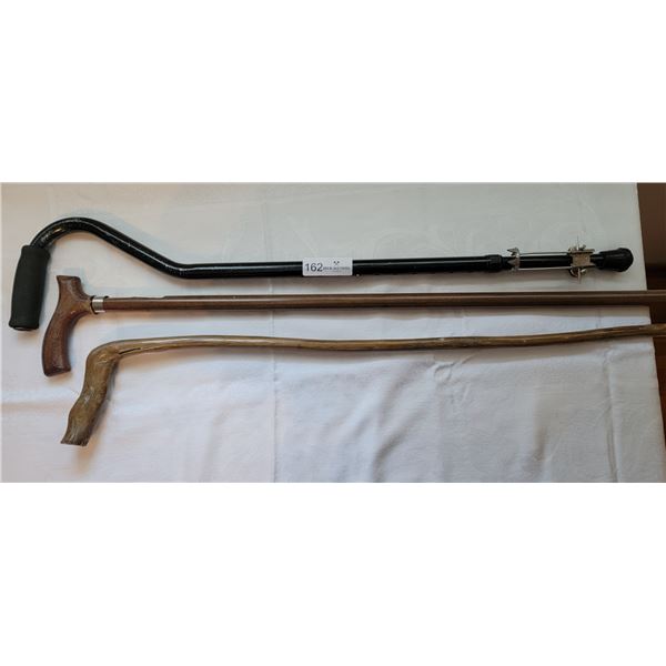 Three Walking Canes With Mirror & Broom Beck Auctions Inc.
