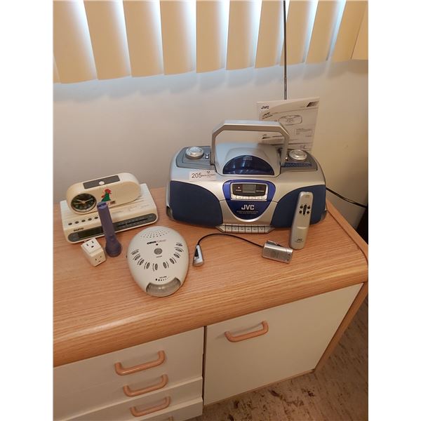 JVC CD portable system. white noise machine, sanyo clock radio & Kellogg's clock radio