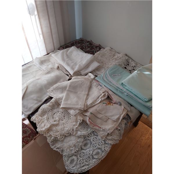 Assorted Table Linens, Doilies, and Table Protectors