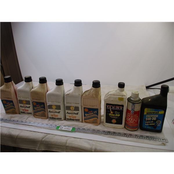 1L Oil and Trans Fluid Oil Containers (Most Full) Bodnarus Auctioneering