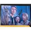 Image 1 : STAR WARS (FISHER,FORD,HAMILL) TRIPLE SIGNED 8 X 10 (RA COA)