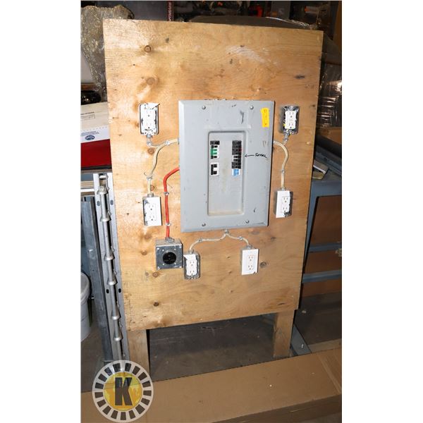 ELECTRICAL PANEL MOUNTED TO PLYWOOD WITH