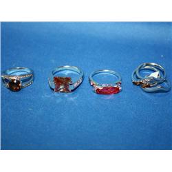 4 Rhodium Plated Costume Rings