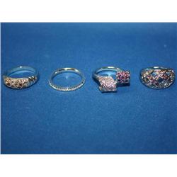 4 Rhodium Plated Costume Rings